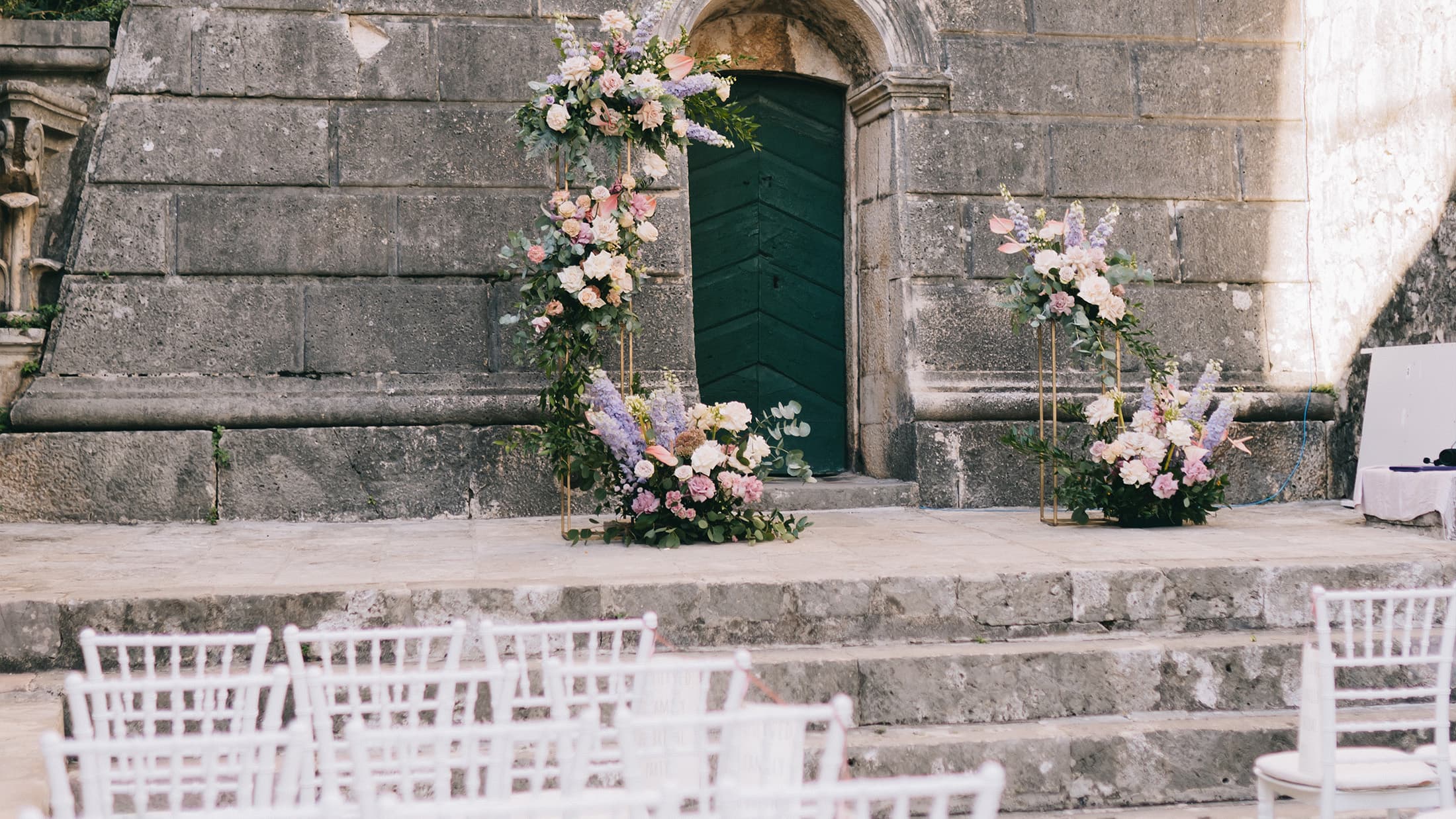 Guests at a wedding in the old square.